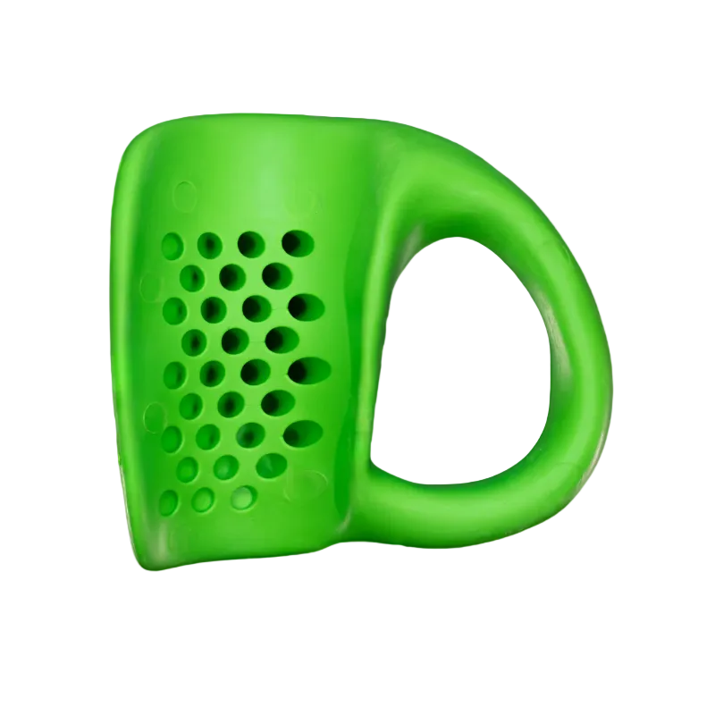 Green plastic tool with a handle and perforated surface on a white background