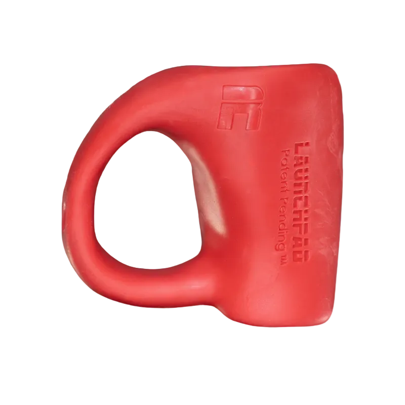 Red thumb guard on white background