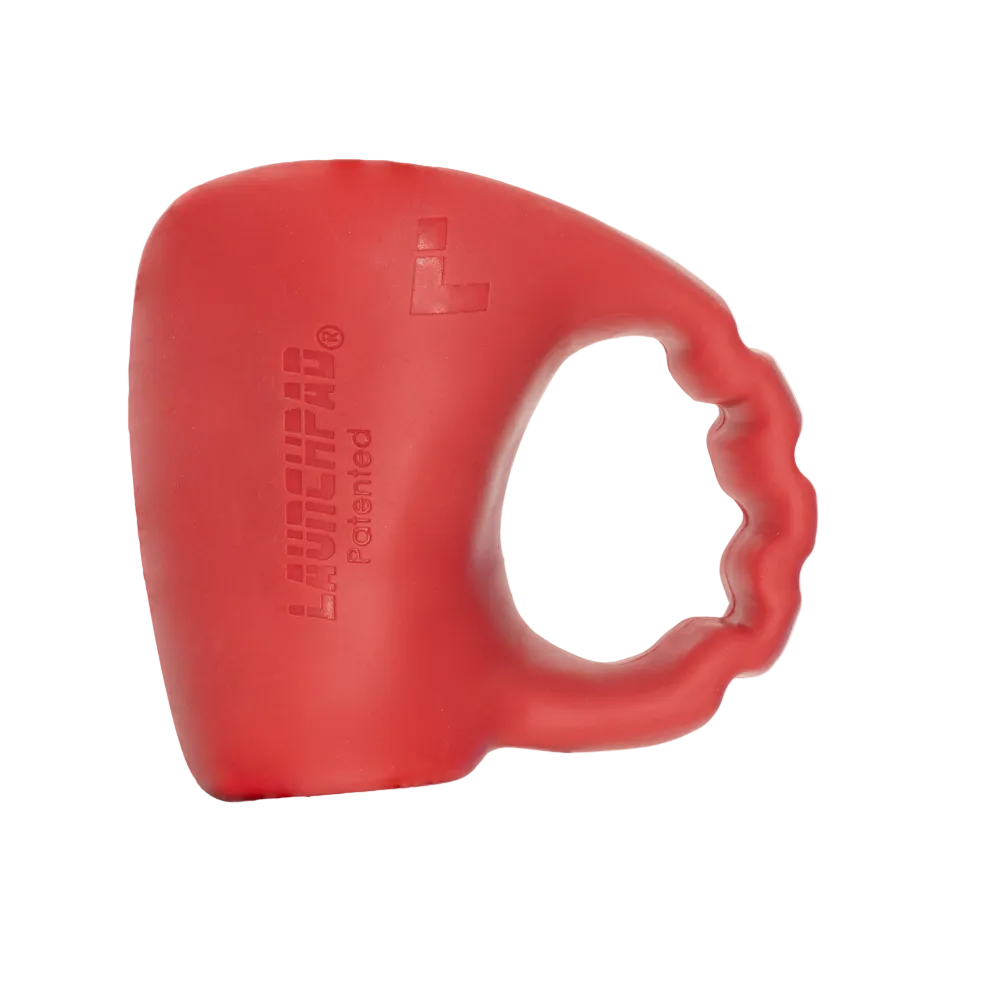 Red Launchpad baseball thumb guard on white background
