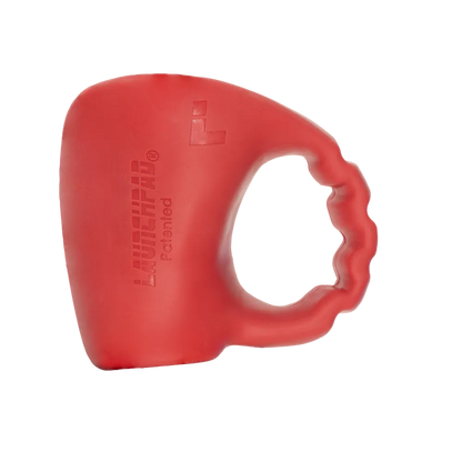 Red Launchpad baseball thumb guard on white background