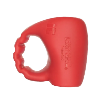 Red Launchpad baseball thumb guard on white background