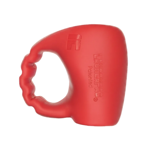 Red Launchpad baseball thumb guard on white background