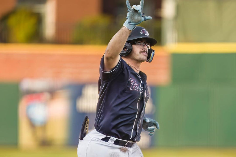 Pro baseball player uses baseball thumb guard to enhance grip and swing control, protect his hand, and increase bat speed