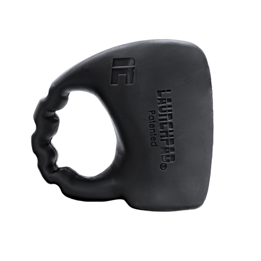 Black Launchpad Max baseball thumb guard for right-handed hitters, hand-specific fit with embossed Launchpad mark
